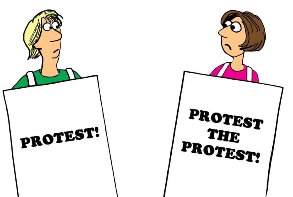 Political cartoon about a woman protesting the protest.