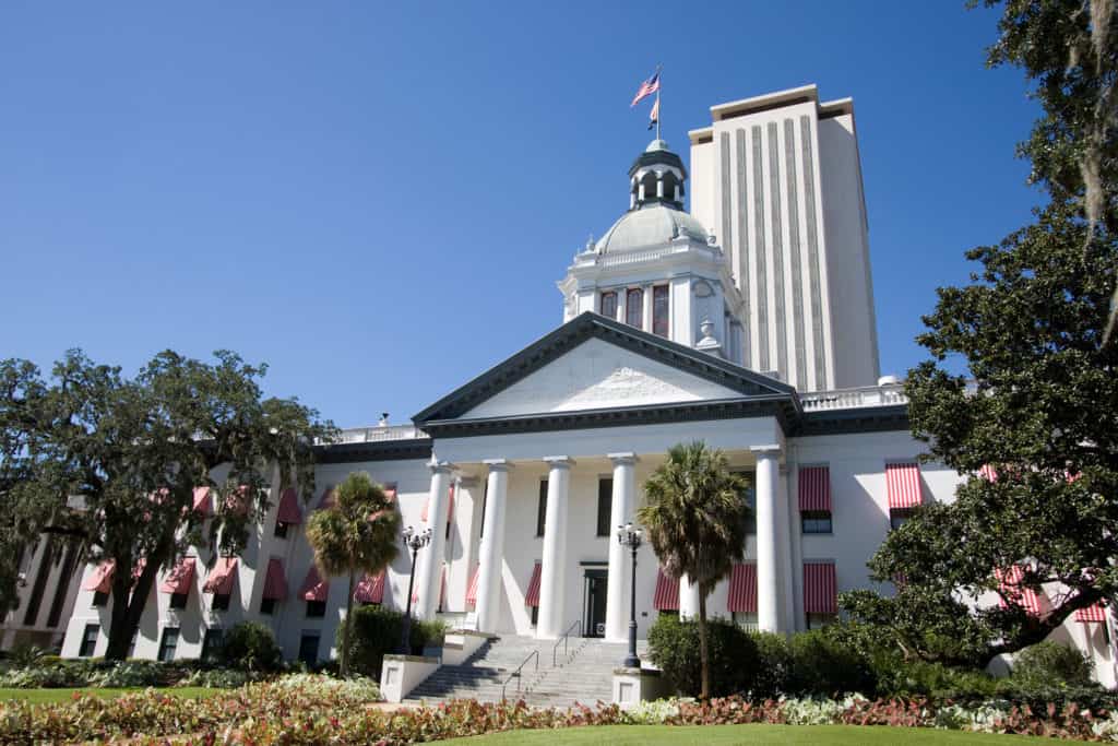 The old Florida State Capital building now a museum stands in front of the new capital offices in Tallahassee Florida.