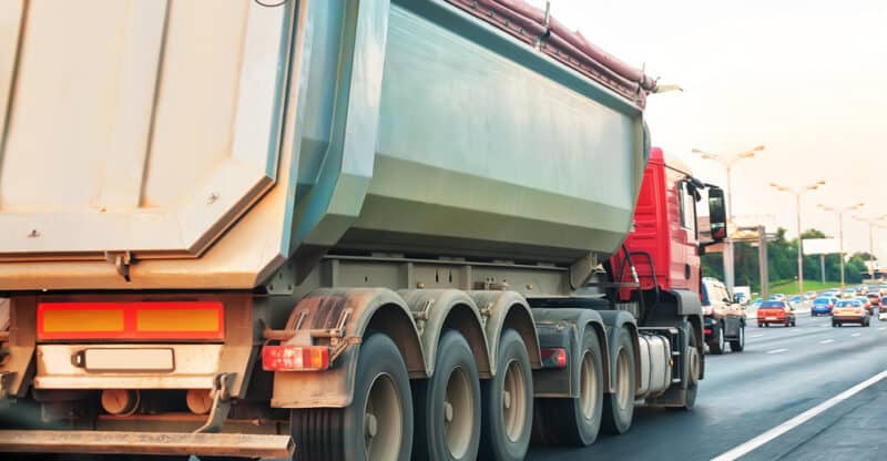 3 Reasons You Are Legally Required to Have a Tarp System on a Dump Truck
