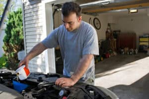 adding more oil to engine