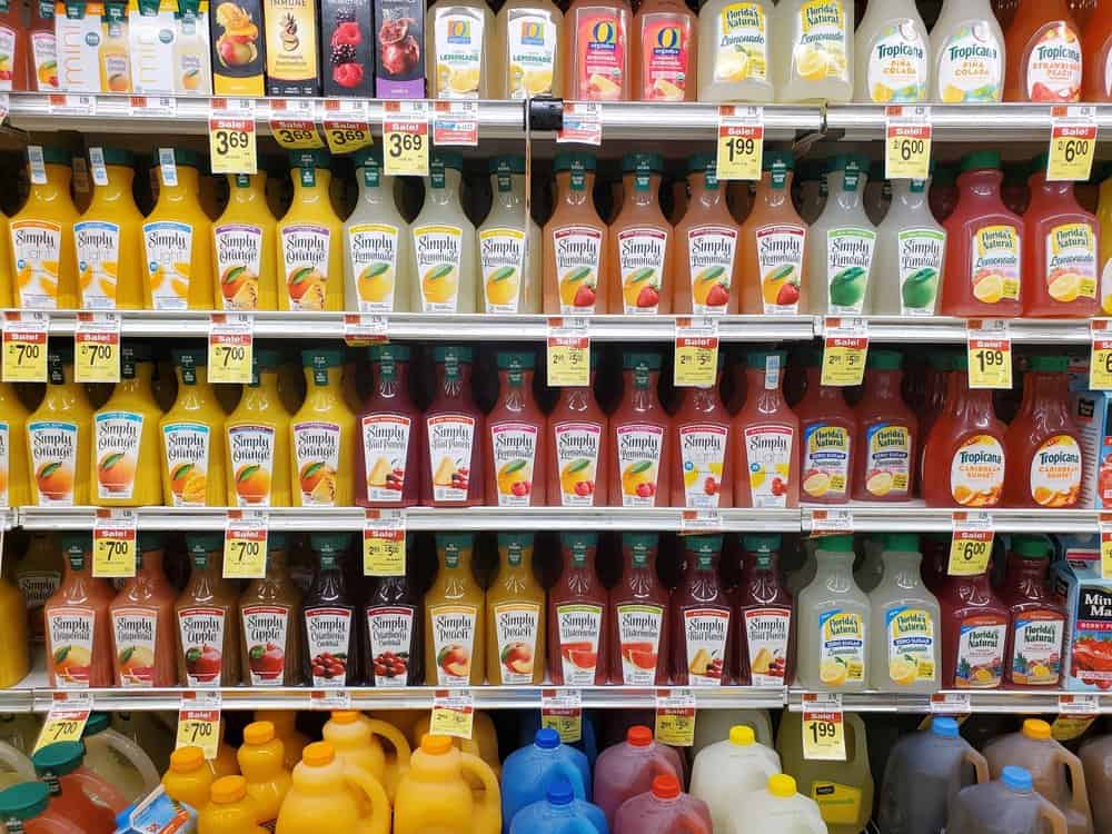 Varieties of fruit juices on the shelves