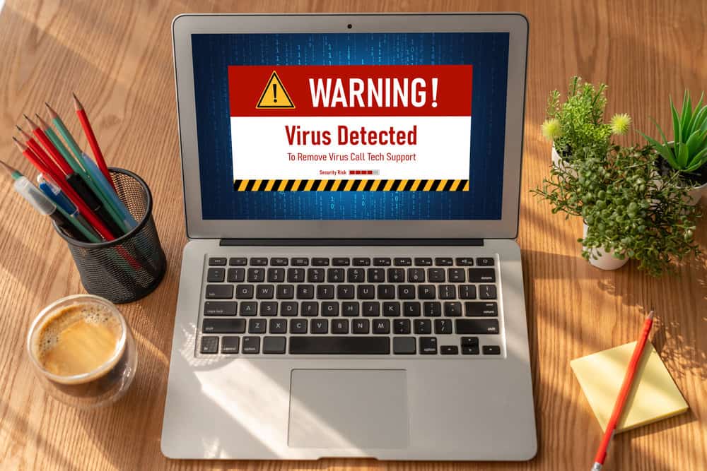 Virus warning alert on computer screen detected major cyber threat