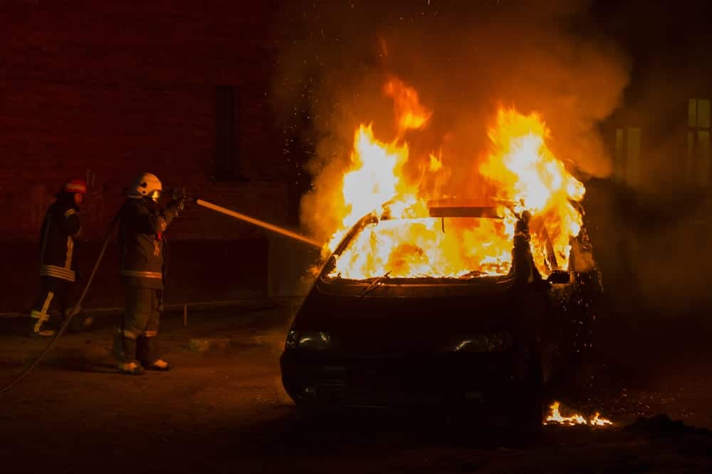 firefighters at car fire