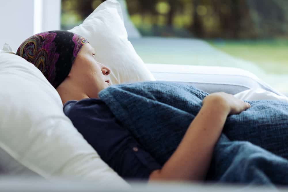 featured image for prescription drug lawsuit article showing sick woman in bed