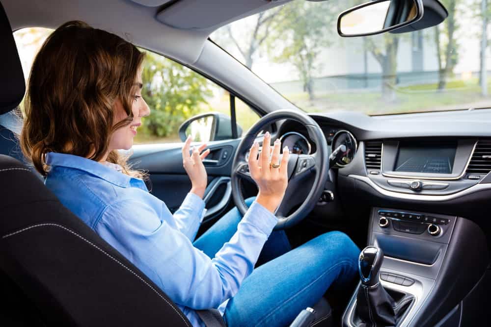 woman using a driverless car