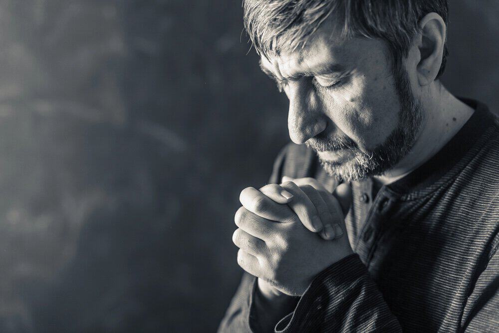 man praying
