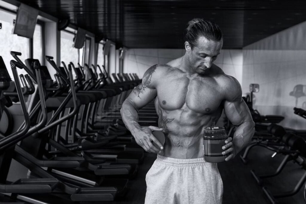 bodybuilder with protein powder