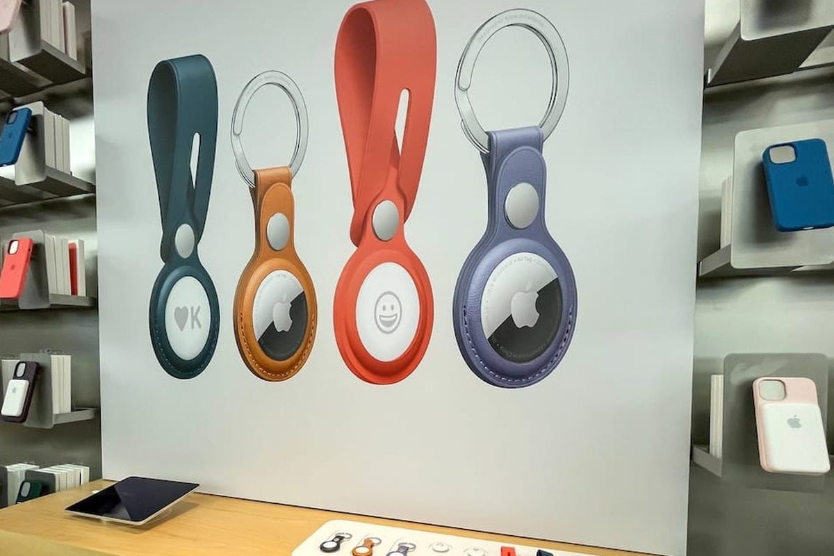 Apple AirTag display with leather key rings and loops in an Apple Store
